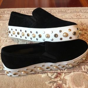 Black studded platform sneakers